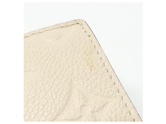 Cartera Metis Compact Monogram Empreinte Louis Vuitton - vista 4