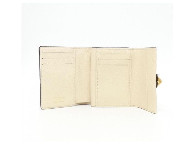 Cartera Metis Compact Monogram Empreinte Louis Vuitton - vista 5