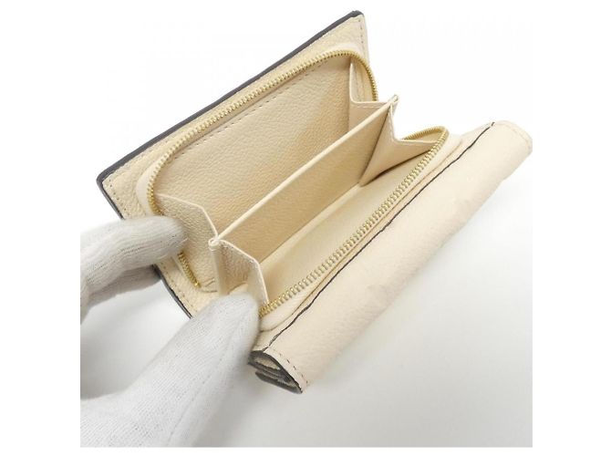 Cartera Metis Compact Monogram Empreinte Louis Vuitton - vista 6