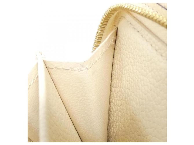Cartera Metis Compact Monogram Empreinte Louis Vuitton - vista 7