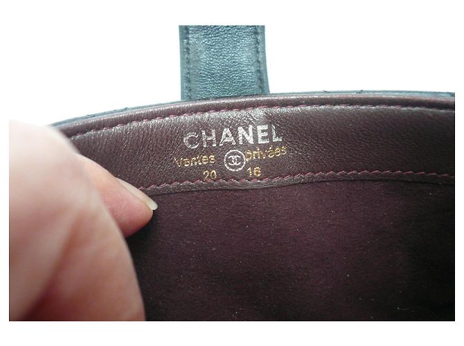 Portafoglio CC CHANEL - O Mini nero trapuntato con zip IN BUONE CONDIZIONI - vista 11