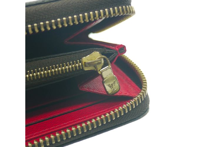 Cartera Larga Louis Vuitton Clemence Castaño Fucsia - vista 8