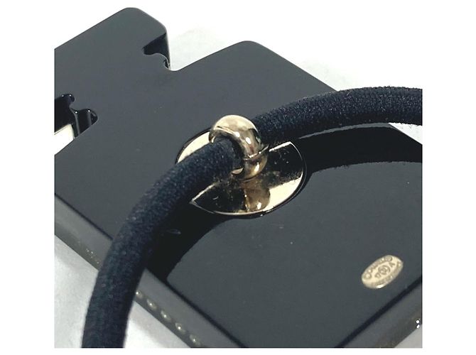 Design della bottiglia di profumo Chanel 17A Logo Elastico per capelli Nero D'oro - vista 10