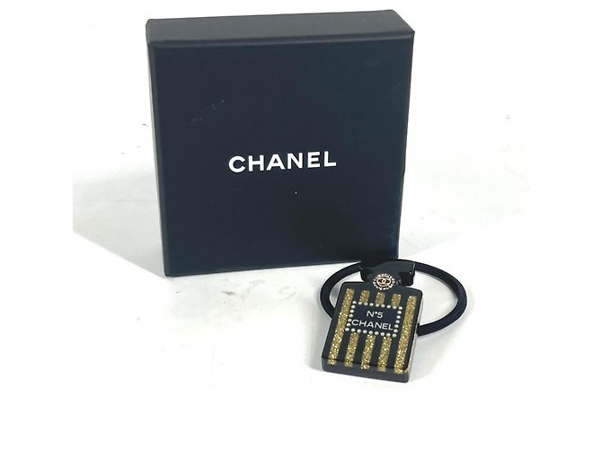 Design della bottiglia di profumo Chanel 17A Logo Elastico per capelli Nero D'oro - vista 12