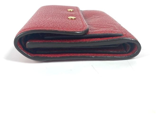 Cartera Tri-fold Monogram Empreinte Louis Vuitton Roja Fucsia - vista 4