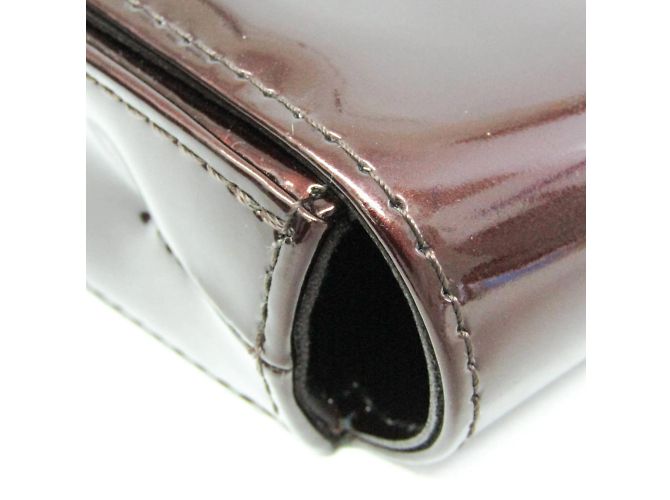 Borsa Clutch Pochette Sobe Vernis Louis Vuitton Bordò - vista 11