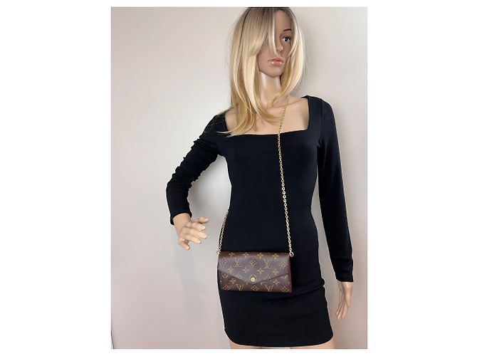 Portafoglio Clutch Sarah Monogram Fucsia Louis Vuitton Marrone - vista 5