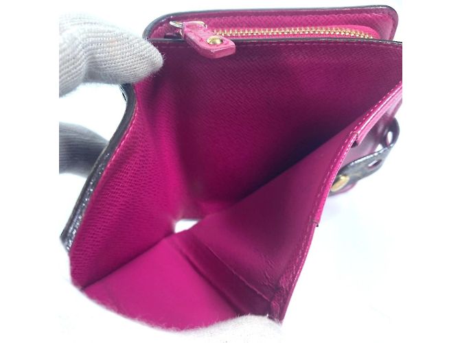 Billetera compacta con cremallera perforada Monogram Louis Vuitton Castaño Rosa Fucsia - vista 17