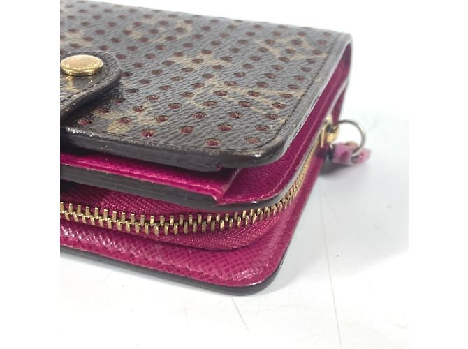 Billetera compacta con cremallera perforada Monogram Louis Vuitton Castaño Rosa Fucsia - vista 9