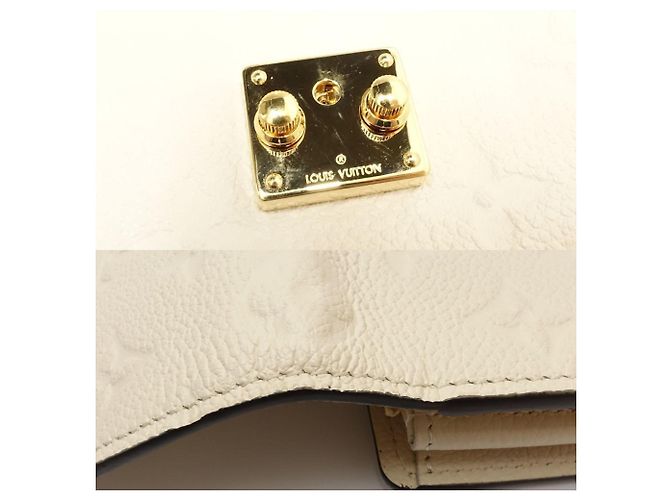 Cartera Larga Monogram Empreinte Louis Vuitton - vista 5