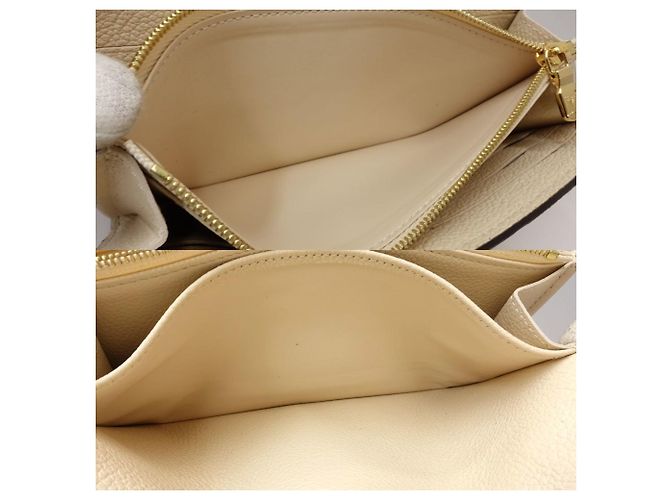Cartera Larga Monogram Empreinte Louis Vuitton - vista 9