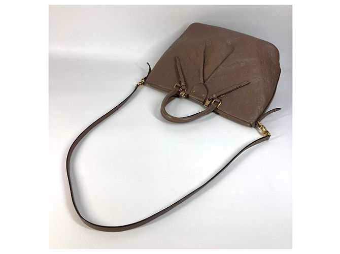 Borsa Motherine MM in Monogram Empreinte Louis Vuitton Beige - vista 5