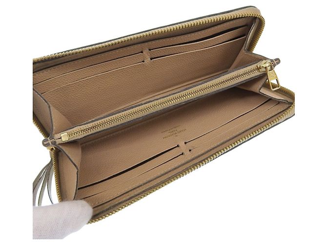 Cartera Larga Monogram Empreinte Louis Vuitton Beige - vista 3
