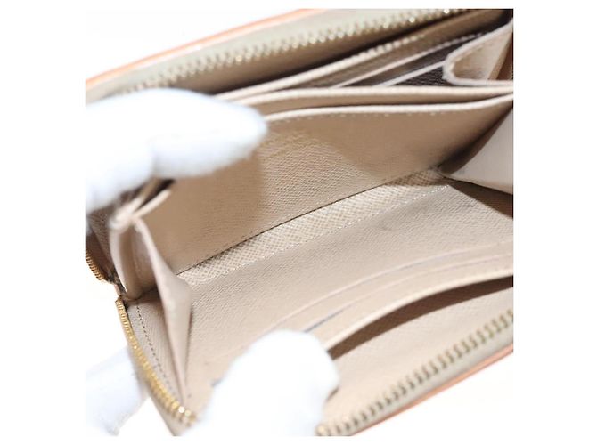 Monedero Zippy de jacquard laminado Monogram LOUIS VUITTON M82483 Auth KD245 Dorado - vista 10