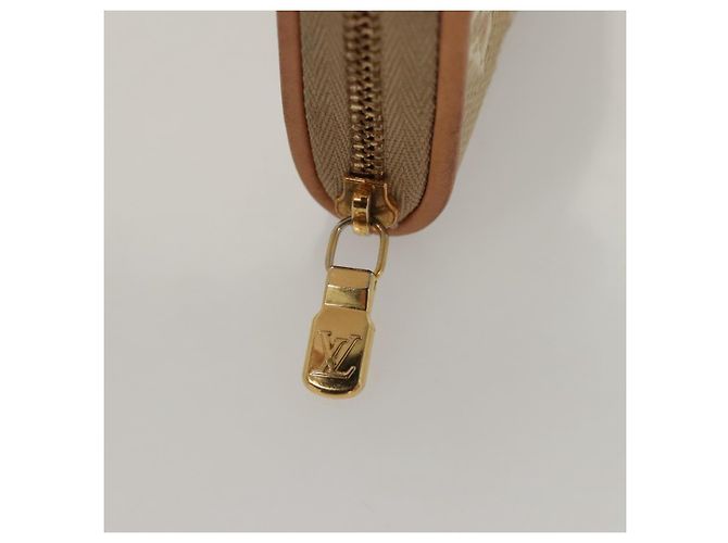 Monedero Zippy de jacquard laminado Monogram LOUIS VUITTON M82483 Auth KD245 Dorado - vista 8