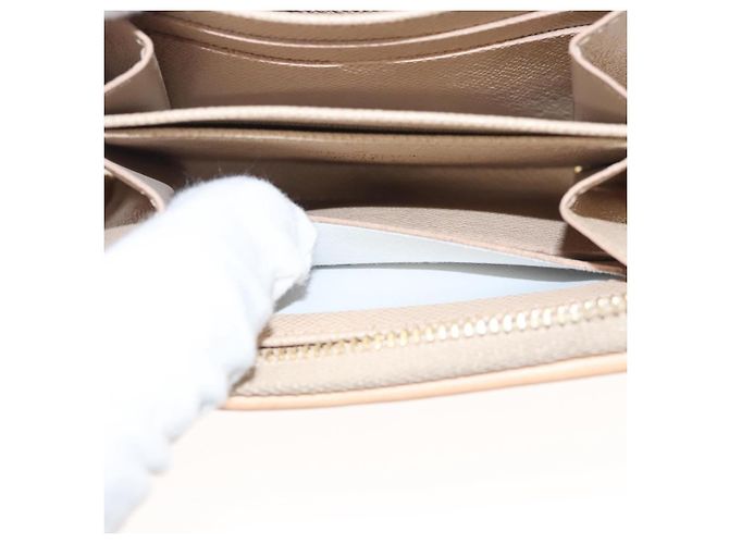 Monedero Zippy de jacquard laminado Monogram LOUIS VUITTON M82483 Auth 116266SM Dorado - vista 11
