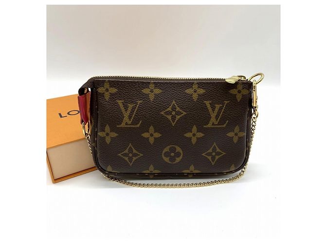 Mini Pochette Accessori Vivienne Holiday di Louis Vuitton Marrone Monogramma - vista 4