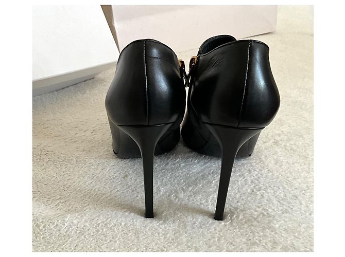 Stivaletti Saint Laurent Palladio in pelle nera con borchie dorate Nero D'oro - vista 7