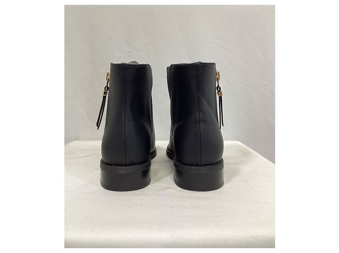 Bota flat Britt da Michael Kors em couro preto - vista 12