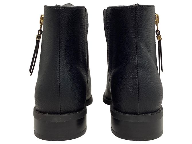 Bota flat Britt da Michael Kors em couro preto - vista 5