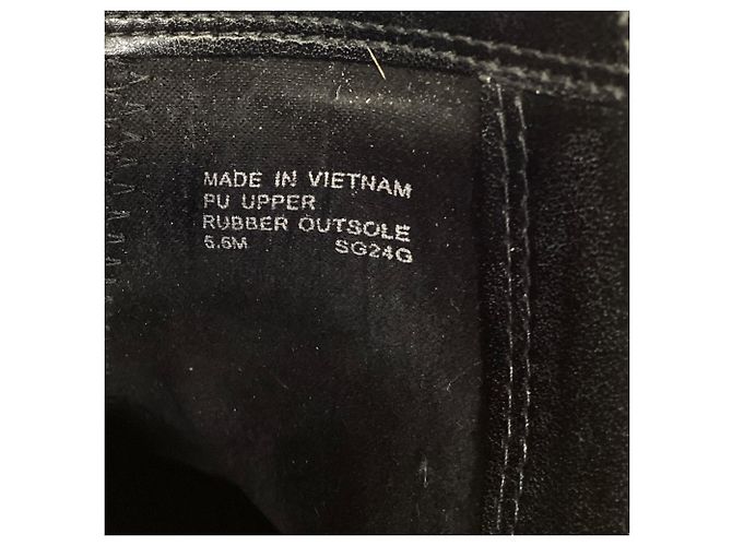 Bota flat Britt da Michael Kors em couro preto - vista 7