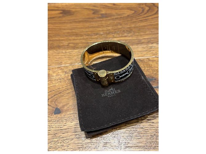 Hermès Bracelete GM Hermes Charnier Preto Dourado - vista 7