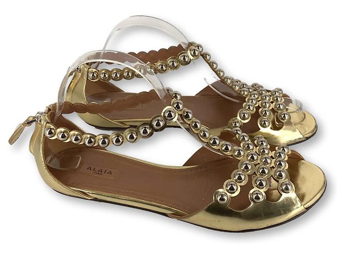 Sandali metallici piatti Alaïa D'oro Gold hardware - vista 2