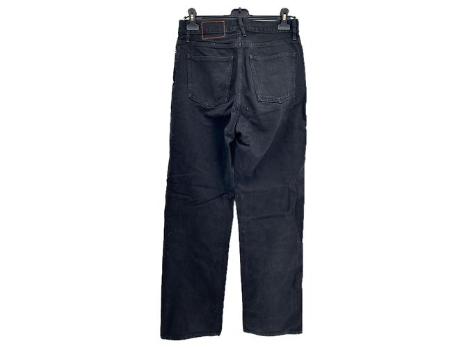Jeans negros Calvin Klein con costuras naranjas Talla 26 - vista 2