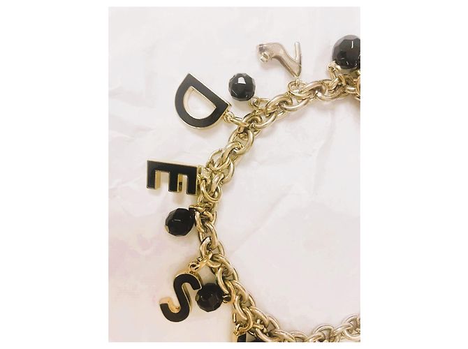 Delizioso bracciale DOLCE & GABBANA acciaio dorato "Desire" con charms D'oro - vista 7
