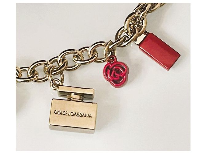 Delizioso bracciale DOLCE & GABBANA acciaio dorato charms rossetto e altri - vista 3