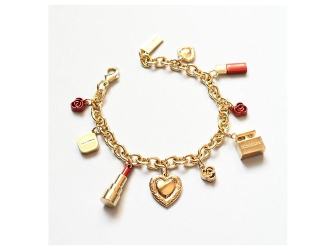 Delizioso bracciale DOLCE & GABBANA acciaio dorato charms rossetto e altri - vista 5