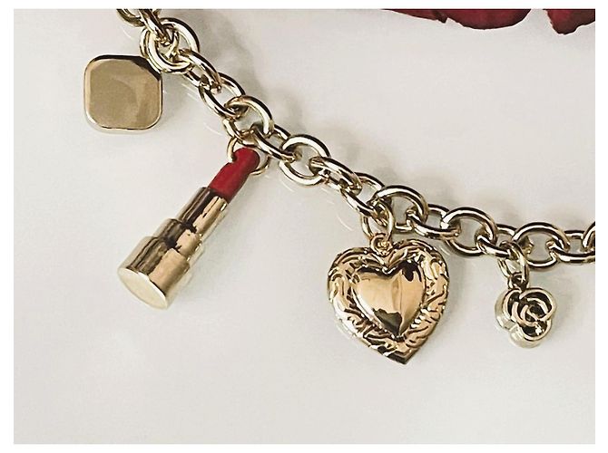 Delizioso bracciale DOLCE & GABBANA acciaio dorato charms rossetto e altri - vista 6