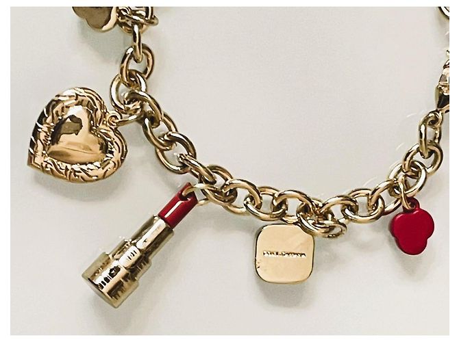 Delizioso bracciale DOLCE & GABBANA acciaio dorato charms rossetto e altri - vista 7