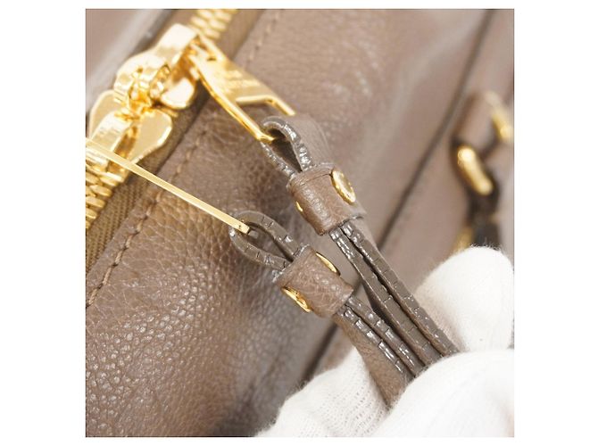 Borsa Louis Vuitton Monogram Empreinte Lumineuse PM Marrone - vista 7