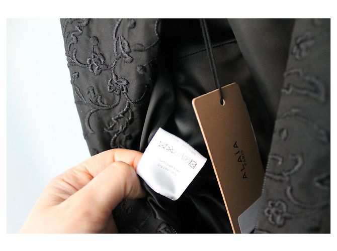 Abito Alaïa nero in cotone con ricami floreali - vista 11