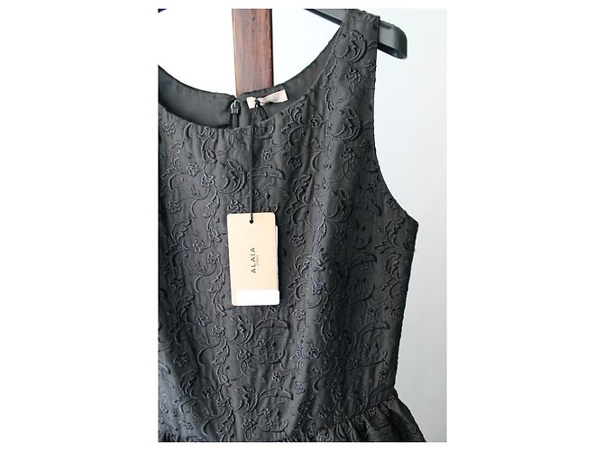 Abito Alaïa nero in cotone con ricami floreali - vista 4