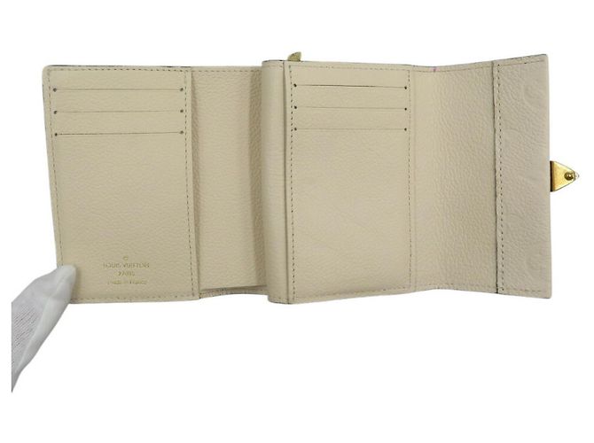 Metis Billetera plegable Monogram Empreinte Louis Vuitton - vista 5
