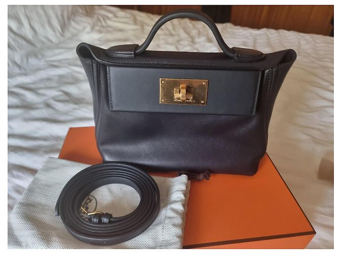 Acapulco Hermès 24/24 Mini in pelle Swift nera finiture oro Nero - vue 2