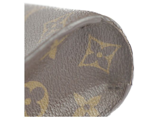 Borsa Clutch Monogram Macassar di Louis Vuitton Marrone Nero - vista 6
