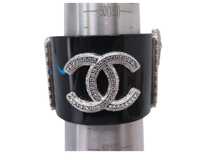 BRACCIALE CHANEL MANCHETTE LOGO CC CRISTALLI 16 CM 2011 BRACCIALE NERO IN RESINA - vista 10