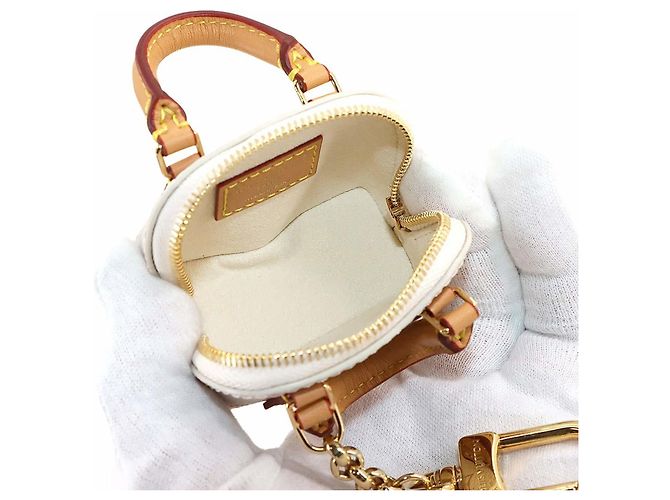 Portachiavi Micro Alma in Monogramma Louis Vuitton D'oro - vista 7
