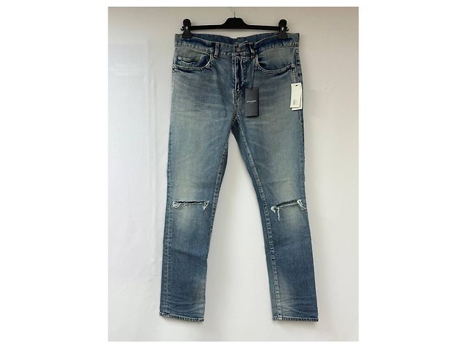 Jeans slim desbotado e rasgado em denim azul da Saint Laurent - vista 6