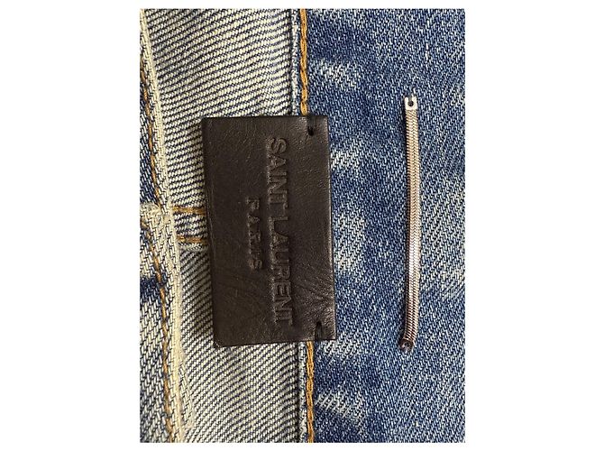 Jeans slim desbotado e rasgado em denim azul da Saint Laurent - vista 9