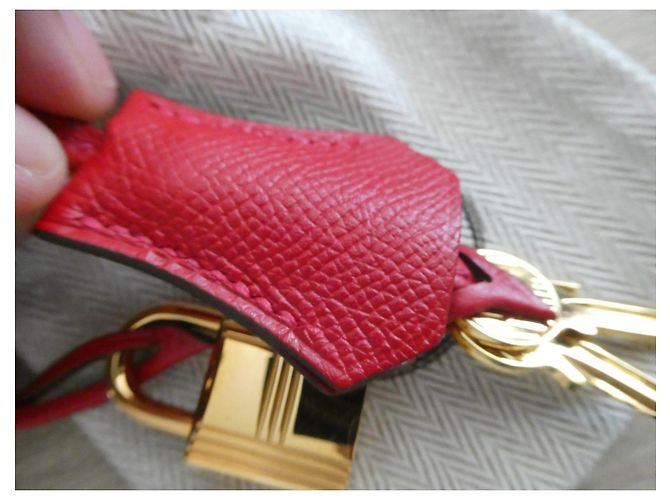 campana, cremallera y candado Hermès en acero dorado con bolsa de polvo para Kelly, Birkin Roja Gold hardware - vista 8