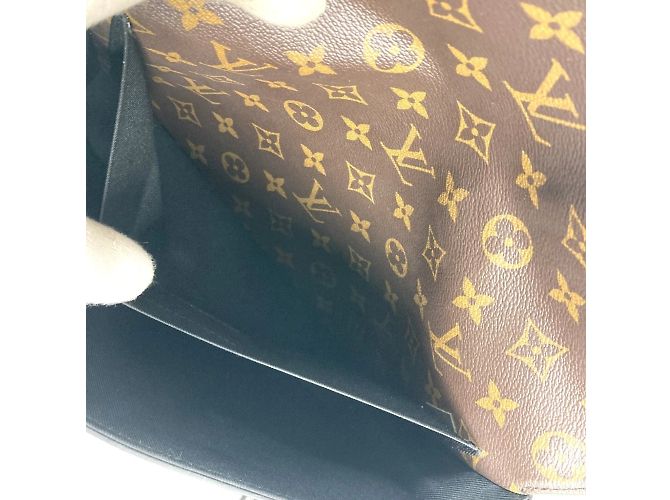 Borsa Pochette Steamer Monogram Taiga Louis Vuitton Marrone Cachi - vista 15