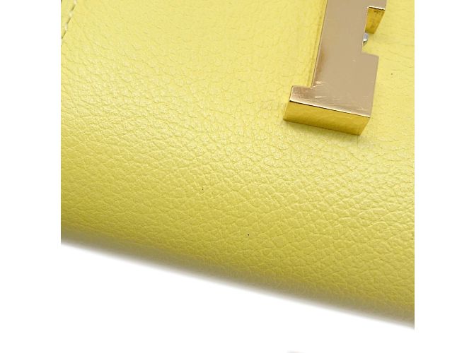 Billetera Compacta Constance de Hermès en Lima Dorado - vista 7