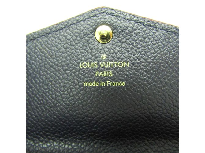 Llave Monogram Empreinte Louis Vuitton M62017 Roja - vista 13