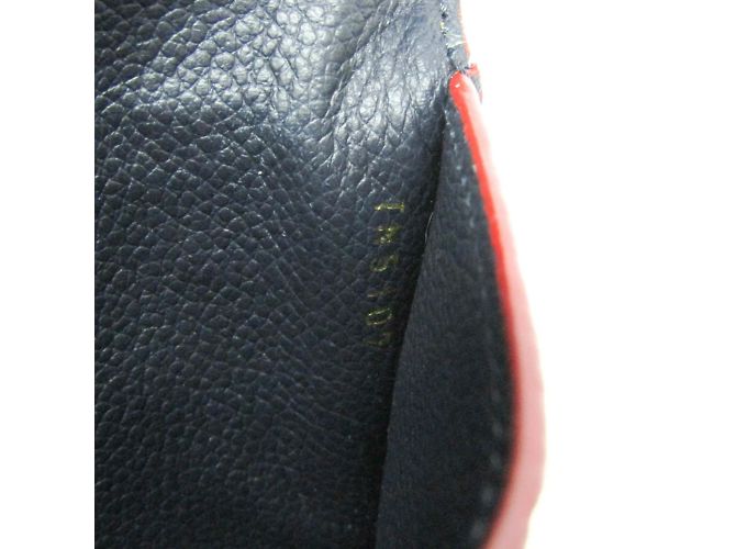 Llave Monogram Empreinte Louis Vuitton M62017 Roja - vista 14