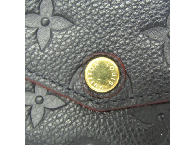 Llave Monogram Empreinte Louis Vuitton M62017 Roja - vista 8