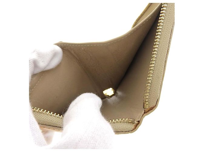 Cartera Bloom Monogram Vernis Louis Vuitton M91015 Beige - vista 4